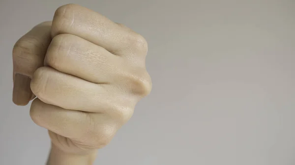 Woman Fist Isolated Light Gray Background Close Camera Front View — Stock Photo, Image