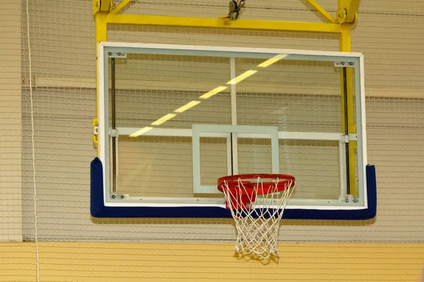 Basketball basket in school sport hall — Stock Photo, Image