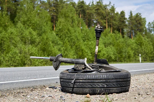 tire of car after accident on a road after a frontal collision