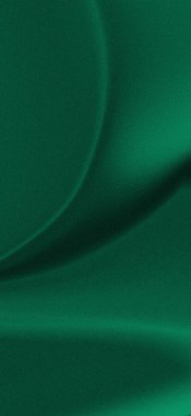 Zengin bir zümrüt yeşili kumaşın yakın plan görüntüsü, desenli yüzeyi ve nazik, akışkan kıvrımları ve gölgeleri sergiliyor..