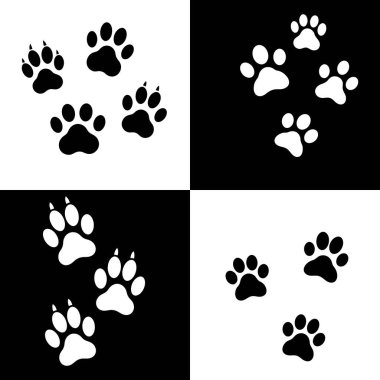 Çelişkili arka planlara sahip dört farklı çeyrekte dizilmiş çoklu siyah ve beyaz pençe izlerine sahip bir grafik tasarımı.