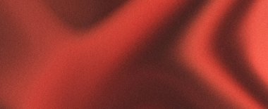 Kalıplı kırmızı kumaşın yakın görüntüsü, derin kıvrımlar ve kontrastlı ışık ve gölgeler lüks bir his için.