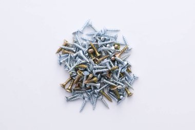 screws arranged on a light background.