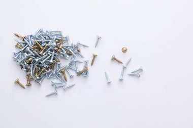 screws arranged on a light background.