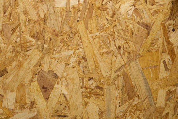 A textured surface of OSB plywood