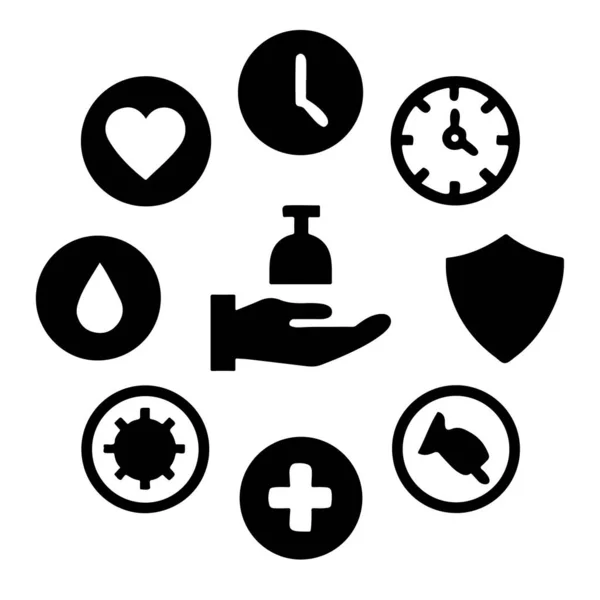 Sağlık ve güvenlik simgeleri el dezenfektanının etrafına dizilmiş.