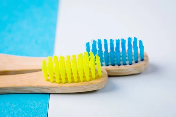 Bright Yellow Blue Bamboo Toothbrushes Eco Friendly Concept Minimalism Copy — Stock Photo, Image