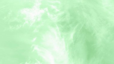 Cirro cumulus bulutları ile yeşil nane gökyüzü. Mermer doku gibi görünüyor. 16:9