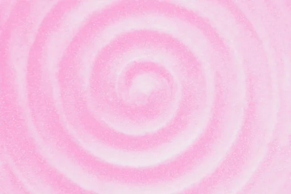 Ceramic dish. Circular vibrations. Pink rippled water waves. Pink background