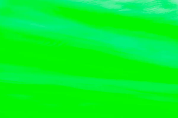 鮮やかな緑色のネオン抽象的なぼやけた現代的な背景 — ストック写真