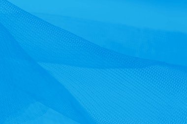 Mavi arkaplanda küçük ağ kumaşı, boşluğu kopyala