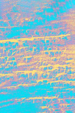 Canlı turkuaz, pembe, ahşap desenli sarı bir arka plan. Renkli arkaplan