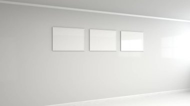 Duvardaki beyaz çerçeve içinde boş beyaz poster