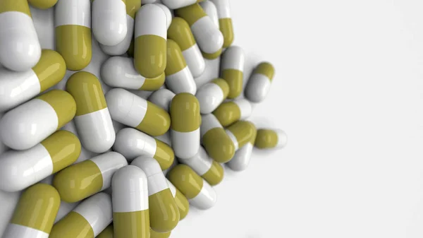 Comprimido de cápsulas de medicamento branco e amarelo — Fotografia de Stock