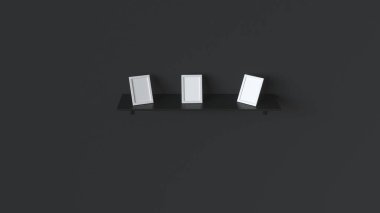 Siyah duvara siyah rafta duran üç boş beyaz fotoğraf çerçeveleri. Resim ya da fotoğraf mockup. 3D render illüstrasyon