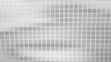 Dalgalı yüzeyi beyaz küpleri parlayan beyaz arka plan ile yapılmış. Soyut geometrik animasyon loop.3d işleme