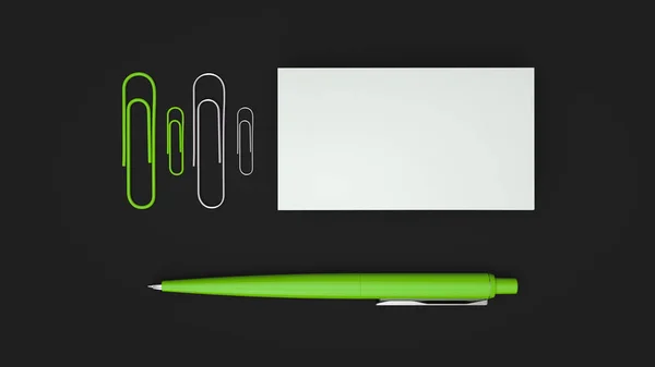 White business cards, paper clips and green automatic ballpoint pen isolated on black background. Blank paper mockup. 3D rendering illustration.