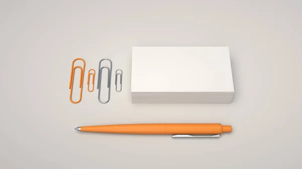 White business cards, paper clips and orange automatic ballpoint pen isolated on white background. Blank paper mockup. 3D rendering illustration.