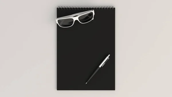 Ordinateur portable avec lunettes de soleil et stylo — Photo