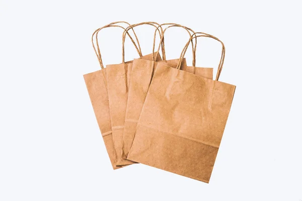 Kraft Bags White Background Row Sale Shopping Gifts — Stock Photo, Image
