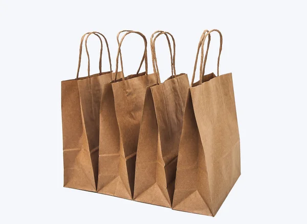 Kraft Bags White Background Row Sale Shopping Gifts — Stock Photo, Image