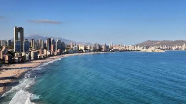 Experience the stunning and breathtaking coastal scenery, which showcases a vibrant skyline and clear turquoise waters