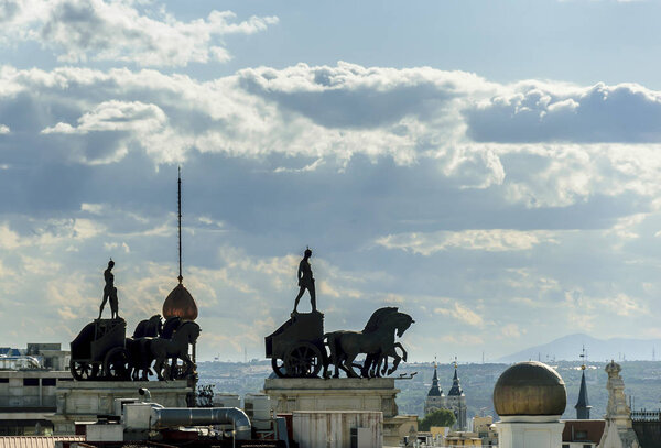 Quadriga sculptures in the sky of Madrid