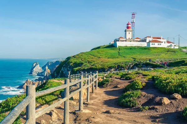 Cabo da Roca, Portugal. Lighthouse and cliffs over Atlantic Ocean, the most westerly point of the European mainland.