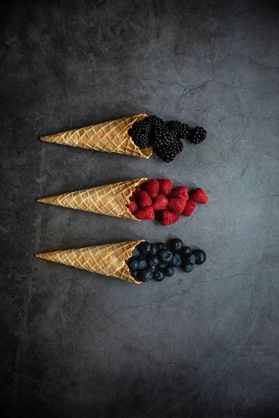 Fresh Berries Waffle Cones Dark Stone Background Top View Concept — Stock Photo, Image