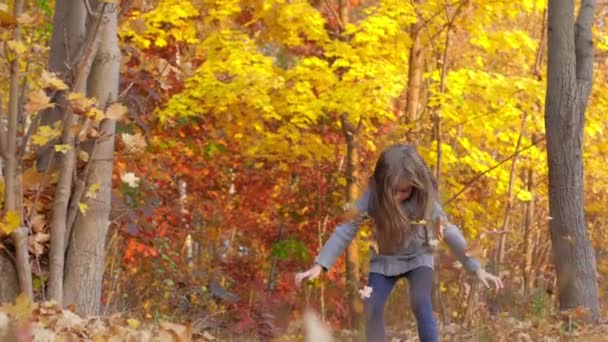Happy Girl Playing Having Fun Autumn Park Throws Leaves Laughs — Stock Video