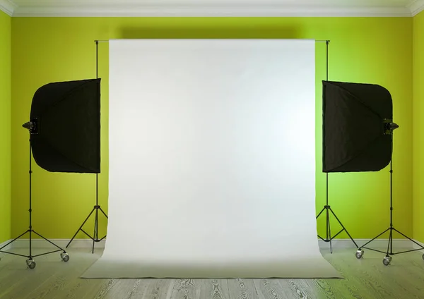 Interior of studio room with equipment. Artificial lighting with softboxes.The saturated yellow-green color of the walls.3D rendering