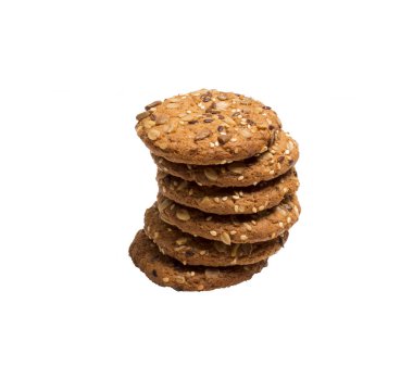 Keten, susam, ayçiçeği tohumu ve kavrulmuş yulaf taneleri ile Yararlı çerezler. Vegan gıda.