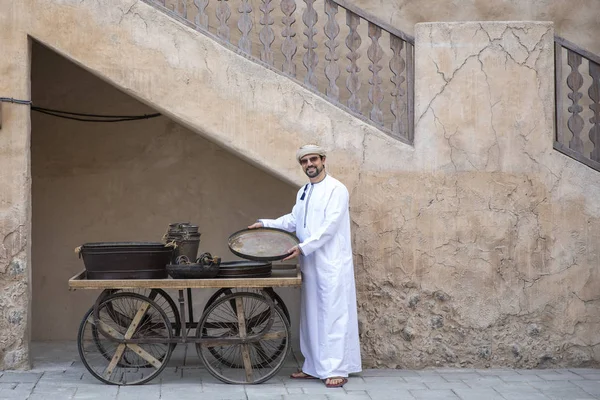 handsome arab man in old Al Seef part of Dubai, United Arab Emirates