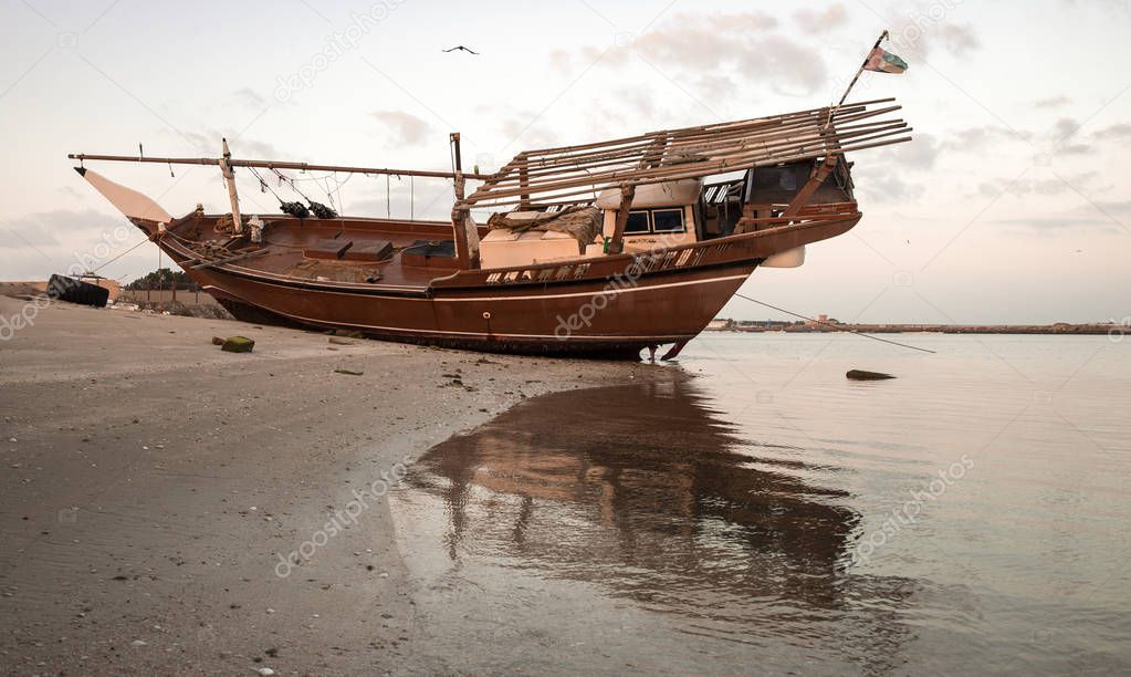 old dhow on beach in Ras al Khaimah, United Arab Emirates