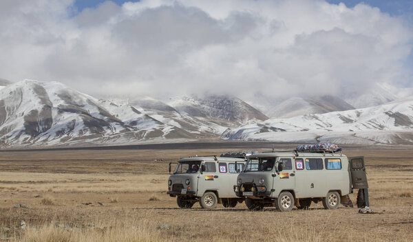 Bayan Olgii, Mongolia - 29th September 2015: mongolian kazakh nomad people packing their yurt into car to make move to more sheltered place for winter season