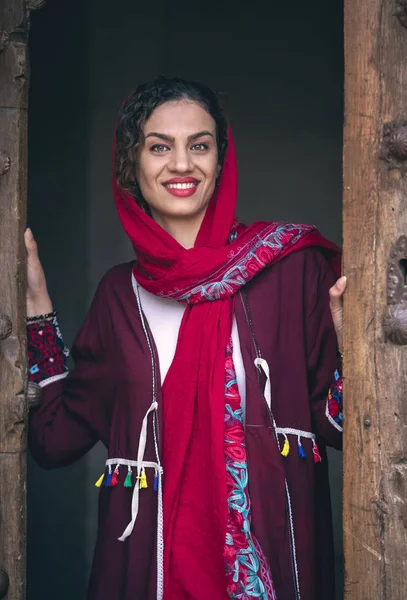 young beautiful Iranian lady in old village in Iran