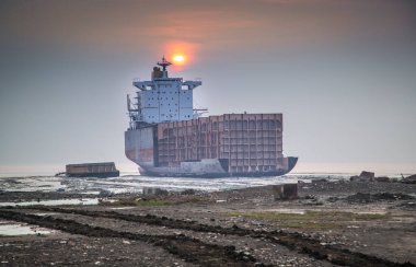 partially broken down ship in ship breaking yard in Chittagong Bangladesh clipart