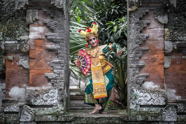 balinese dancer posing for the camera