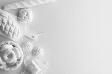 Ekmek, uzun somun, çörek, ekmek yapım ürünleri beyaz bir arka plan üzerinde beyaz rakam tek renkli bileşimi. Metin için kopya yer ile banner. Üstten Görünüm gıda kümesi. 3D render.