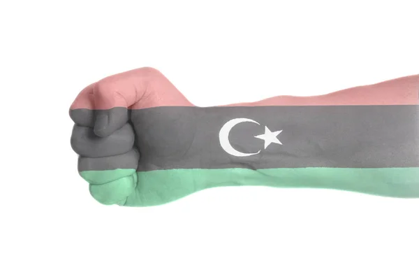 Líbia Zászlaja Férfi Kezét Összeszorított Öklével Elszigetelt Fehér Background — Stock Fotó