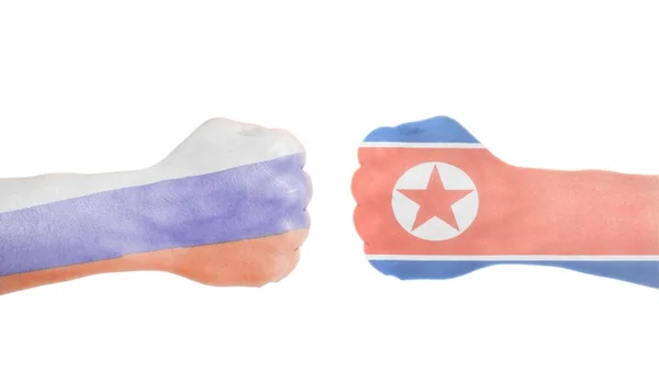 Bandeiras Norte Coreanas Russas Pintadas Dois Punhos Cerrados Fundo Branco — Fotografia de Stock