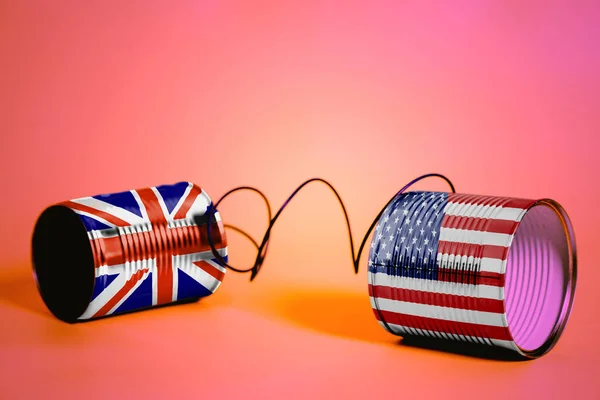 Tin Can Phone Usa British Flags Communication Concept Pink — Stock Photo, Image