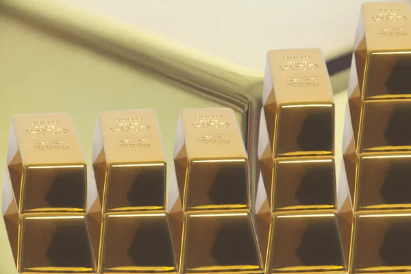 Stacked bars of gold bullion closeup .Financial concept