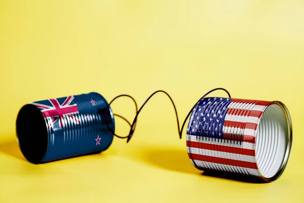 Tin Can Phone Usa New Zealand Flag Communication Concept Yellow — Stock Photo, Image