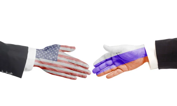 Handshake gesture businessmans hands with Russian and USA flag isolated on white background
