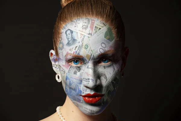 Woman face with money texture isolated on black background