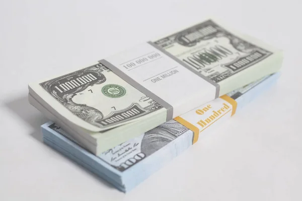 Denomination in one million and one hundred dollars bills with tape — Stock Photo, Image