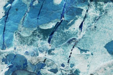 Duvar. Taş bir doku ile mavi. Güzel sıradışı arka plan