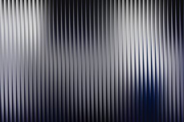 Yumuşak mavi ve gri ışıklandırmalı soyut dikey tırtıklı dokunun tasviri