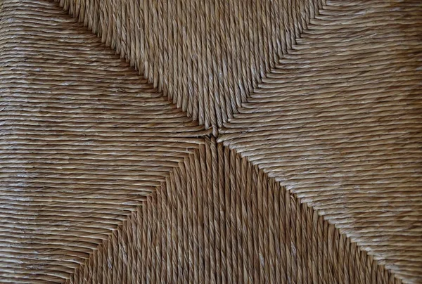 macro detail of a straw chair